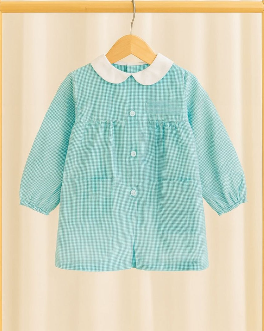 grembiule verde da bambina