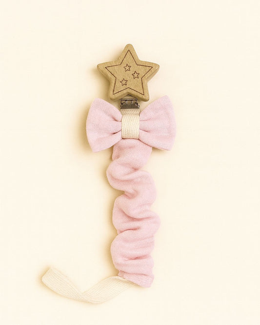 clip porta ciuccio in legno a forma di stella con nastrino rosa e fiocco
