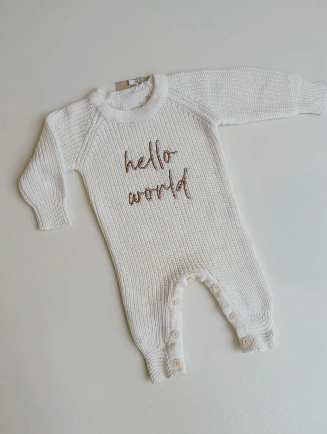 tutina a coste in cotone caldo bianca con ricamo hello world