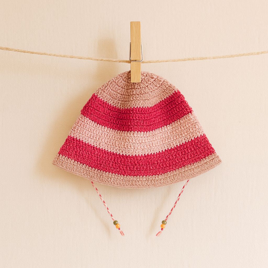 cappellino alla pescatora per bambine a strisce rosa e fucsia