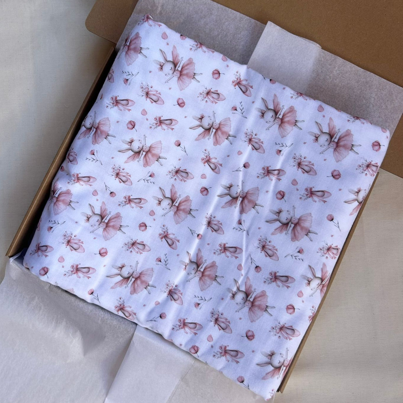 mussola di cotone con conigliette rosa