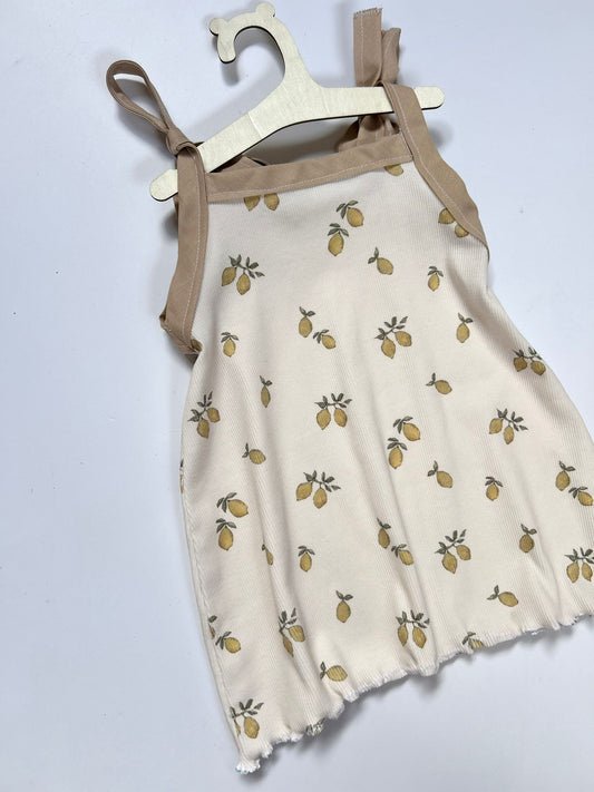 abitino prendisole bambina in jersey di cotone fantasia limoni su fondo bianco
